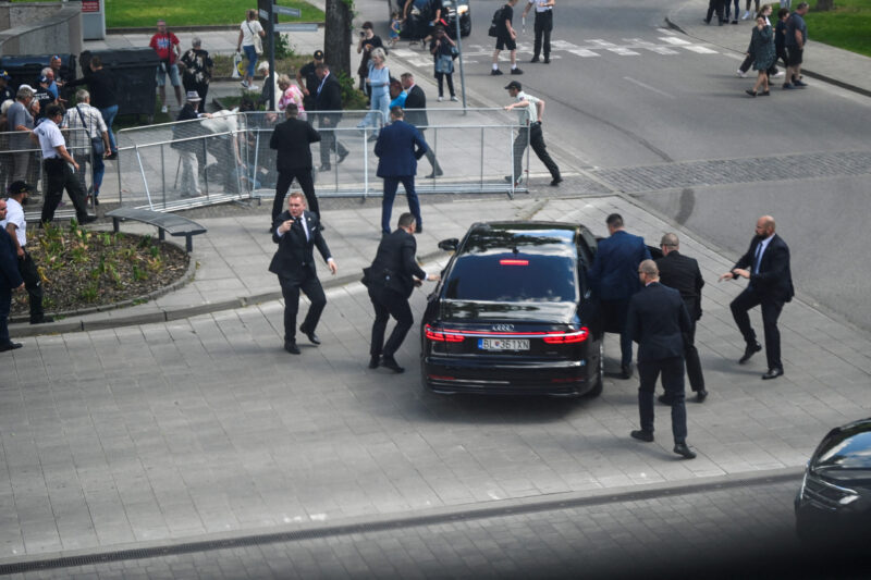 Security officers move Slovak PM Robert Fico in a car after a shooting incident, after a Slovak government meeting in Handlova, Slovakia, May 15, 2024. REUTERS/Radovan Stoklasa     TPX IMAGES OF THE DAY